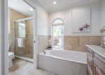 Master Bathroom with Walk in Shower and Soaking Tub
